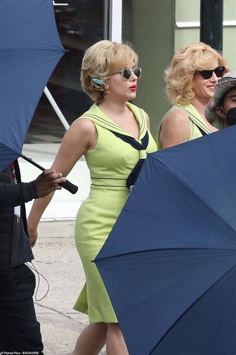 Scarlett Johansson works alongside a stunt double on movie set